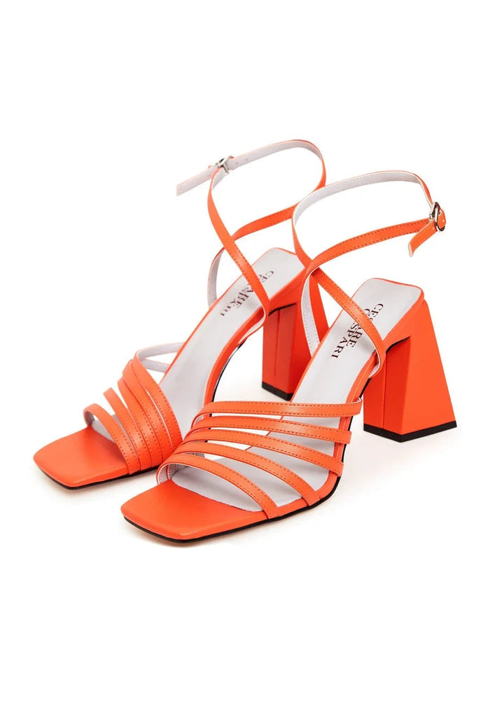 A pair of stylish orange women's sandals with a chunky and comfortable design, perfect for all-day wear.