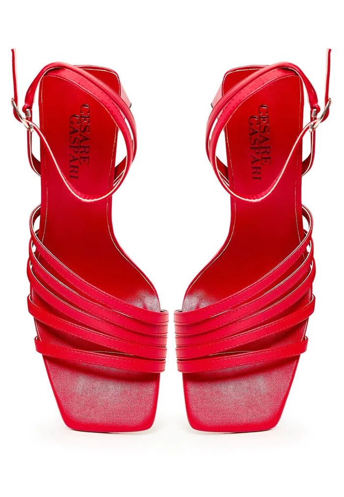 A pair of stylish red chunky comfort sandals for women - the perfect combination of fashion and comfort in comfortable footwear.