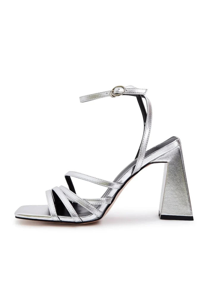 A pair of silver chunky comfort sandals with strappy design, perfect for women looking for stylish and comfortable platform sandals for casual summer wear.