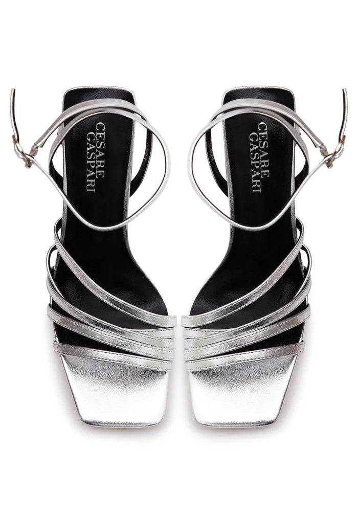 A pair of silver platform chunky sandals featuring comfortable strappy design for women, ideal for casual summer wear.