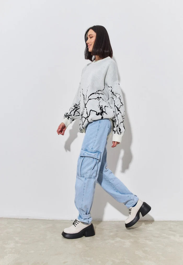A trendy pair of chunky white loafers, the perfect fashion statement for women.
