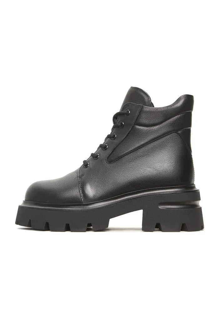 A sleek pair of black leather Freya ankle boots with platform and chunky heels.