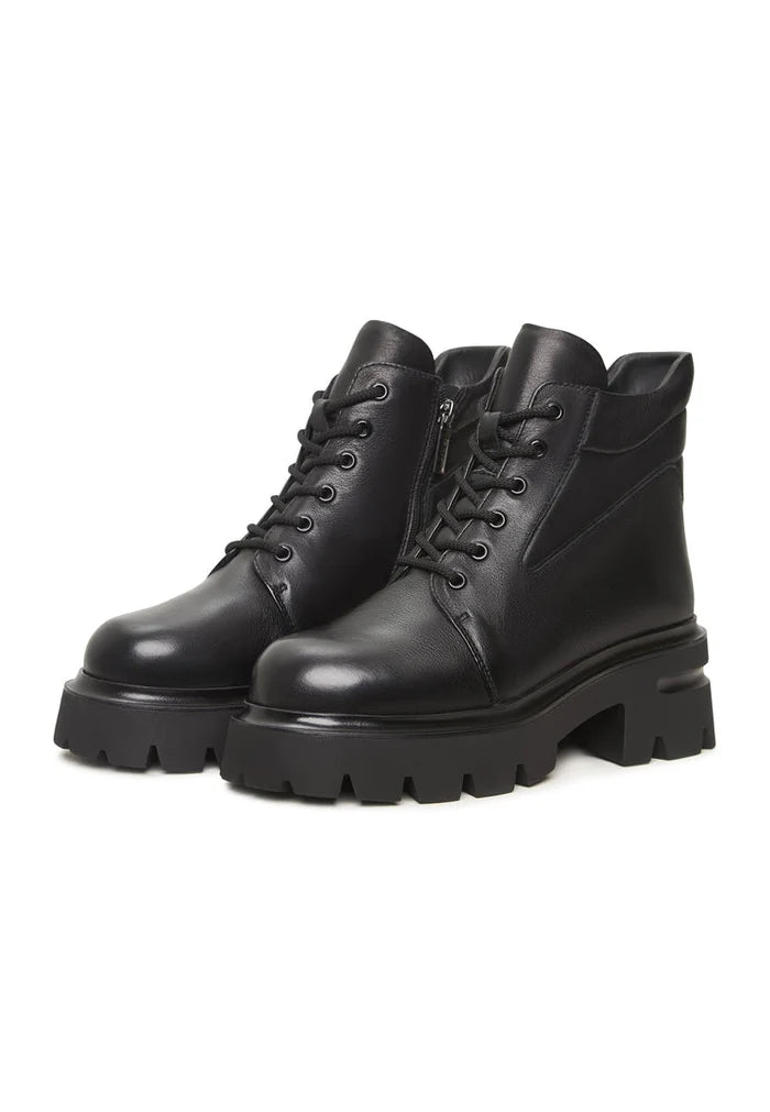 A trendy pair of black leather Freya platform ankle boots with chunky heels.