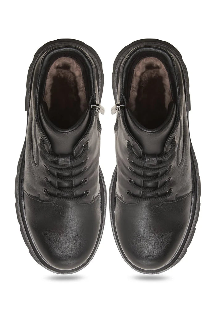A stylish pair of platform ankle boots with chunky heels, crafted from high-quality leather, known as the Freya boots in classic black color.