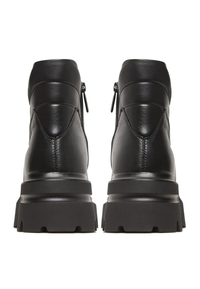 A trendy pair of black leather Freya platform ankle boots with chunky heels.