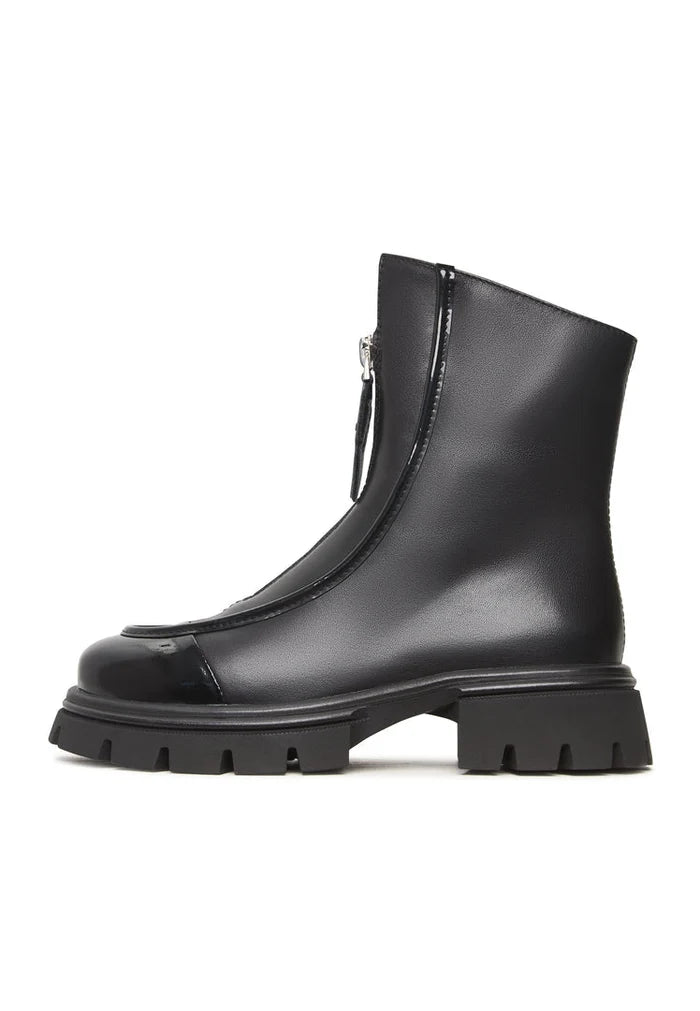 A stylish pair of black chunky zipper ankle boots, perfect for adding a touch of edge to any outfit.