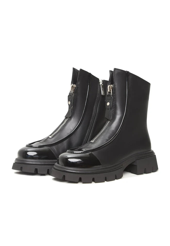 A stylish pair of black chunky zipper ankle boots with a trendy design perfect for any outfit, like the Jaq ankle boots.