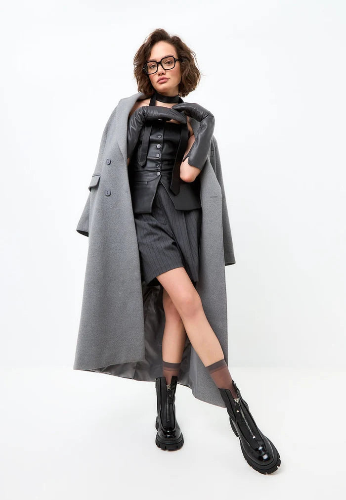 Pair of trendy black chunky ankle boots with a zipper feature, perfect for adding a touch of edge to any outfit - the Jaq ankle boots.