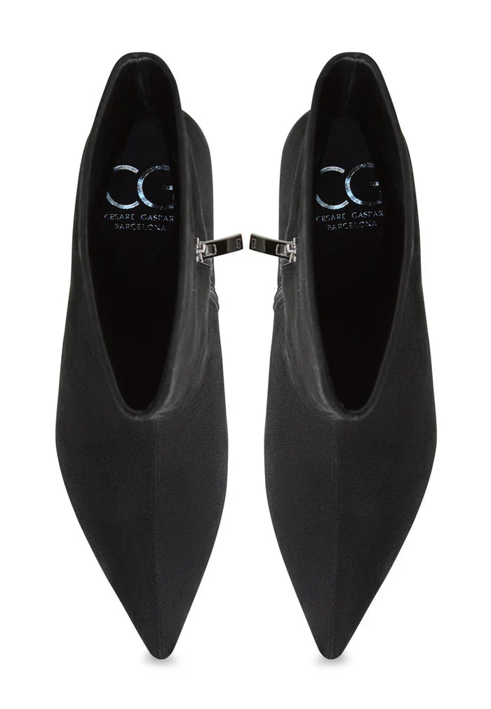 A stylish pair of black leather Regina ankle boots for women, classic and versatile must-have footwear.