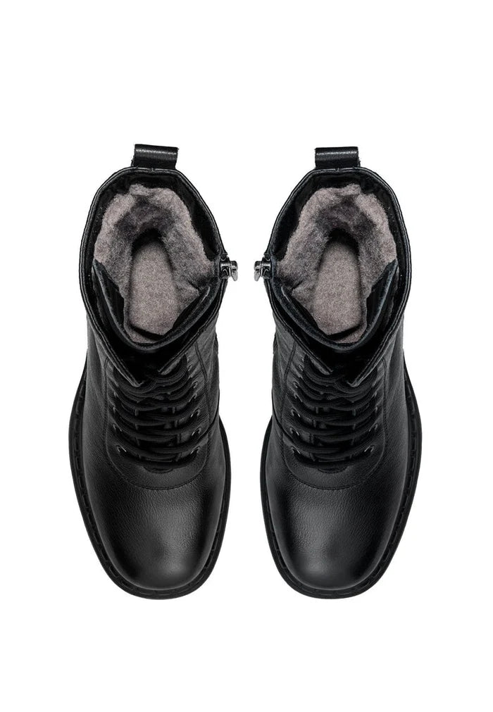 A pair of stylish and classic block heeled winter boots with cozy wool insoles for women's fashion.