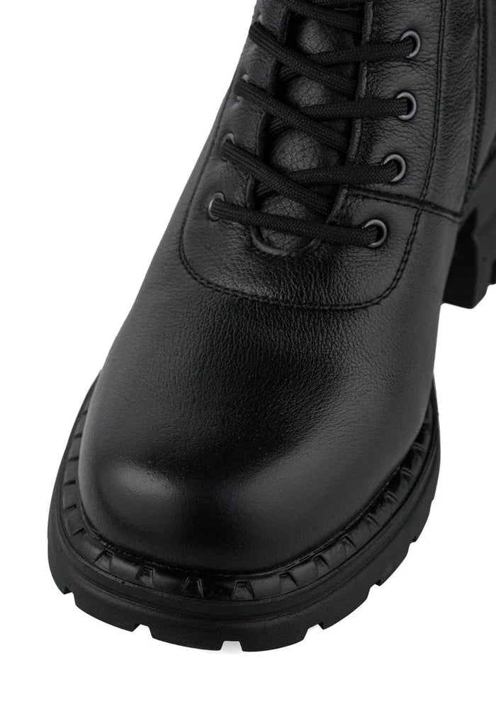 A stylish pair of classic women's block heeled boots, perfect for a fashionable look.