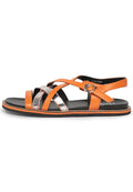 A pair of stylish women's flat sole sandals, perfect for summer, featuring classic design.