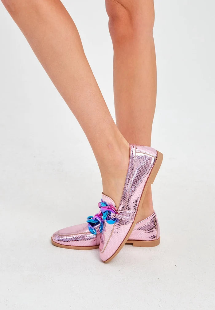 A pair of metallic pink leather loafers with a flat sole, showcasing classic style in women's fashion shoes.