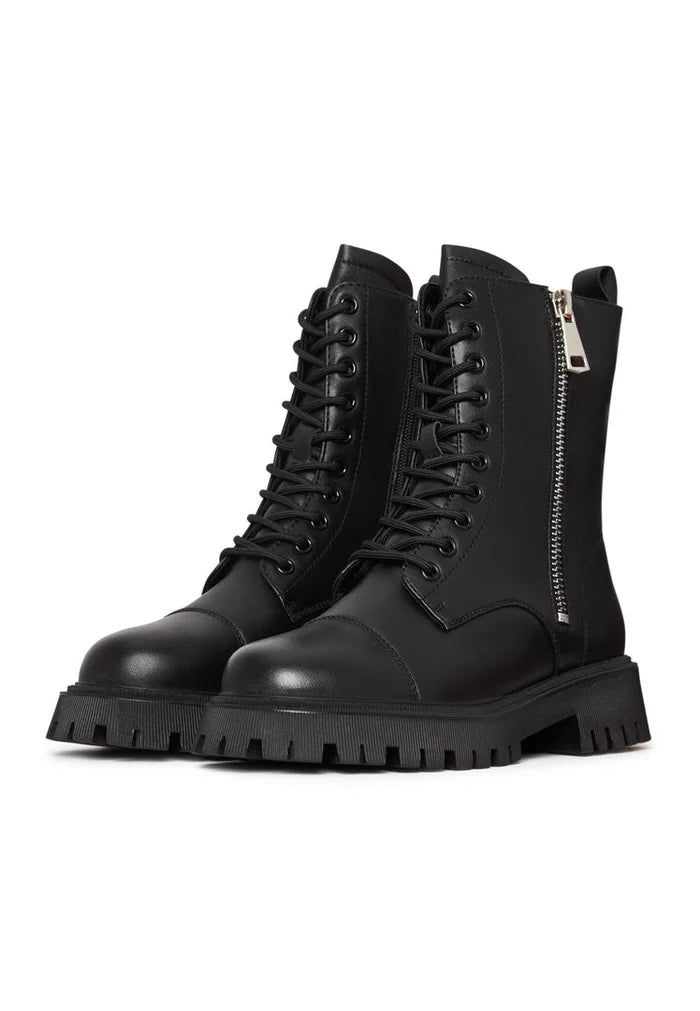 A stylish pair of black leather platform ankle boots for women, a classic staple in any wardrobe.