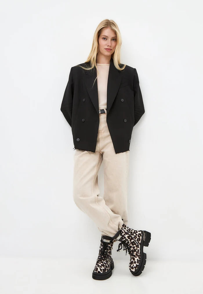 A stylish pair of classic leather platform ankle boots with a trendy Luna leopard print design, perfect for a fashionable look.