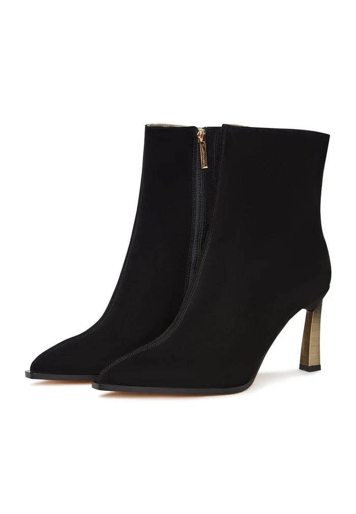 A stylish pair of black stiletto heel ankle boots - the Scarlett ankle boots, perfect for any outfit!