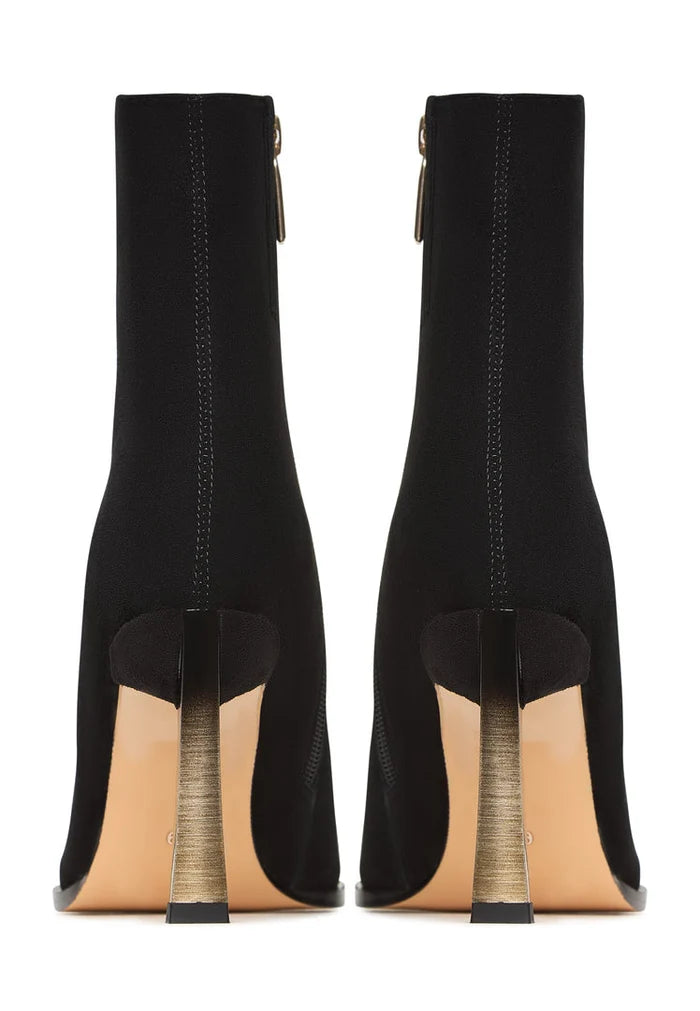 A pair of sleek black stiletto heel ankle boots, also known as Scarlett ankle boots, featuring a chic and stylish design perfect for any occasion.