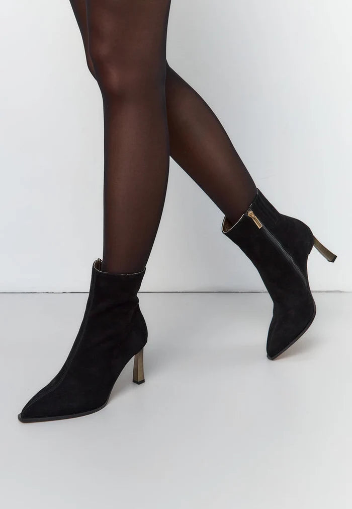 A pair of sleek black stiletto heel ankle boots in a rich scarlet color, perfect for adding a bold statement to your outfit.