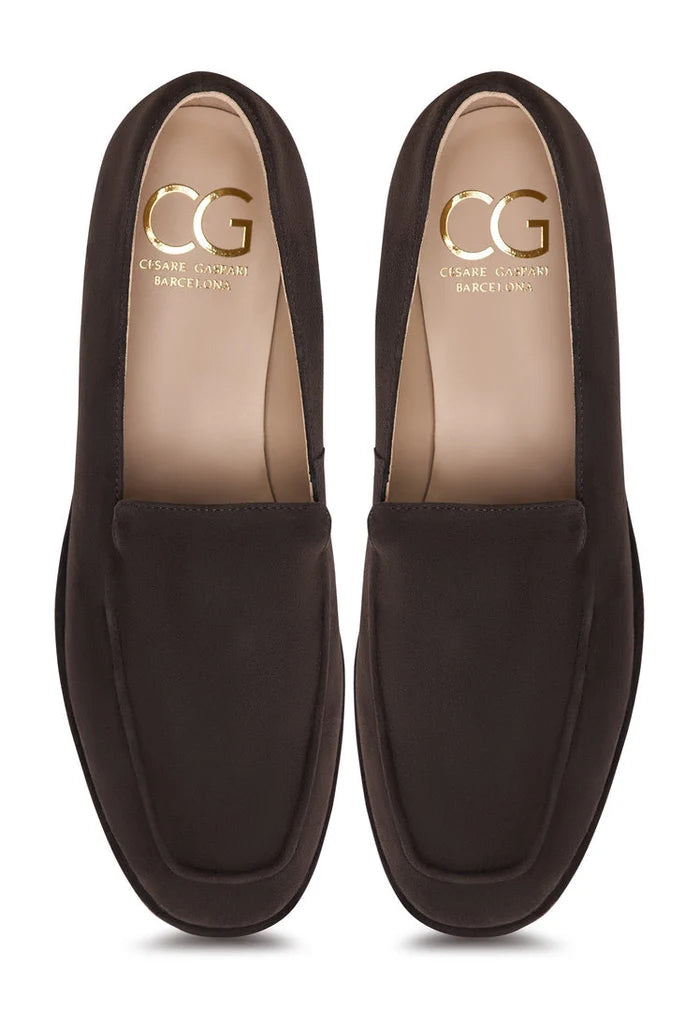 A stylish pair of brown suede loafers with a comfortable platform design, perfect for everyday wear from Clau.