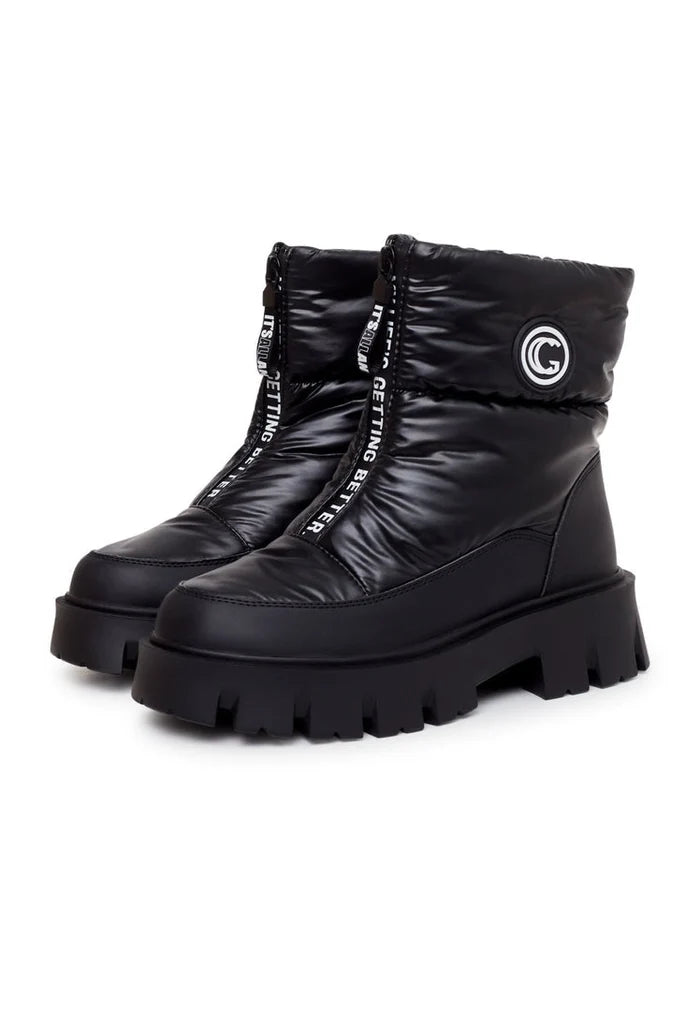 A pair of trendy black winter boots, perfect for staying cozy and chic in the cold weather. These stylish winter fashion footwear are a must-have for the season.