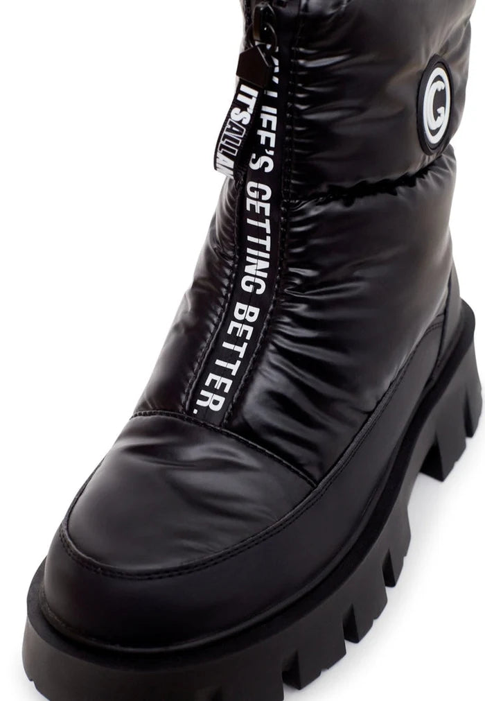 Stay stylish and cozy this winter with these trendy black winter boots - the perfect addition to your winter fashion footwear collection.