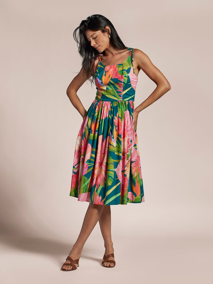 Multi-colored floral-print Deco Bouquet Carmela dress, full front view, beige background.
