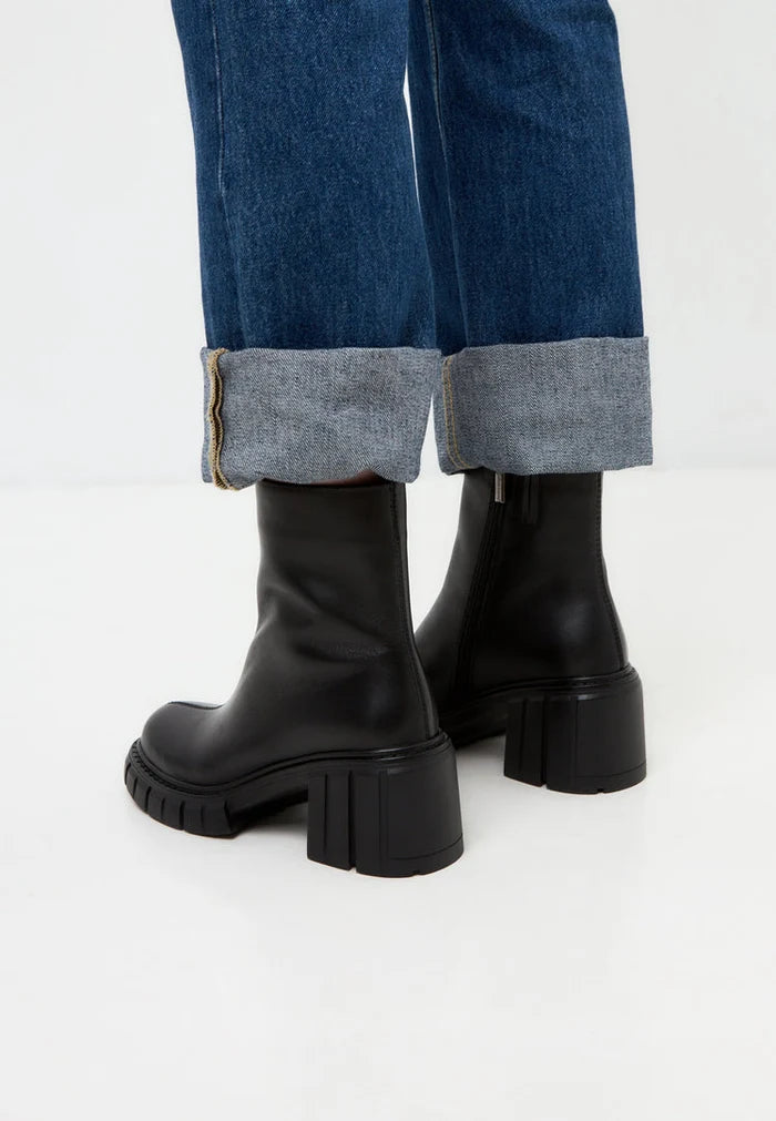 A stylish pair of chunky heel Gio boots - a must-have in any fashion-forward wardrobe.