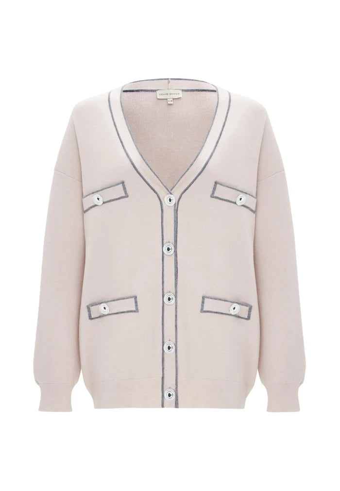 A woman wearing a cozy and stylish knit cardigan, ideal for an elegant and fashionable look.