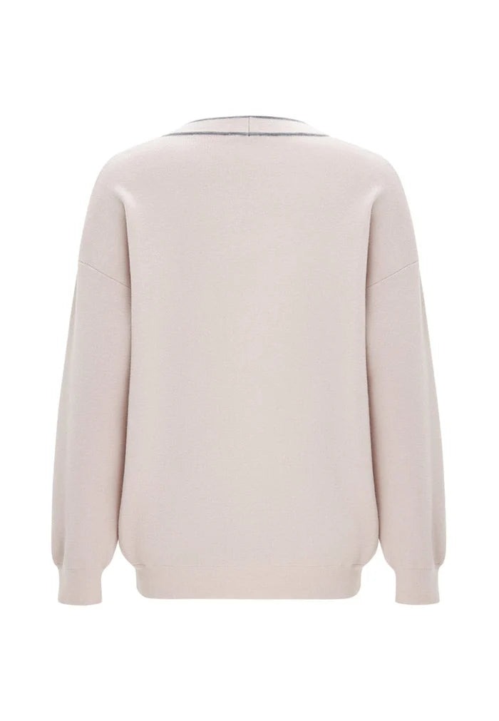 A stylish and cozy knit cardigan perfect for a luxurious and fashionable look.