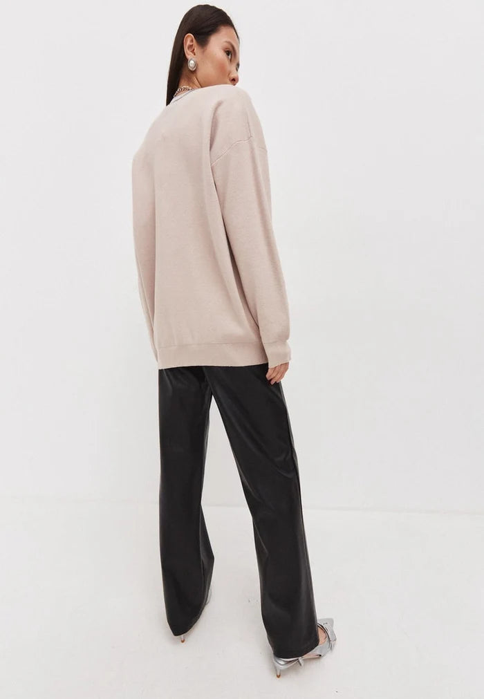 A luxurious and elegant knitwear cardigan, perfect for staying stylish and cozy.