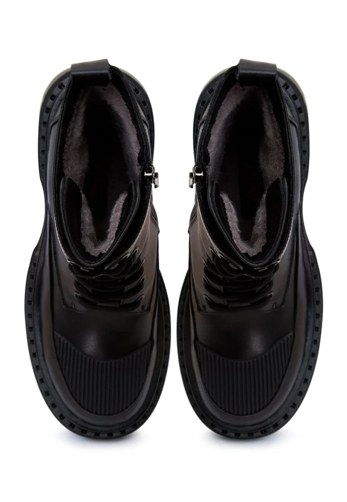 A pair of trendy lace-up ankle boots in black, perfect for any stylish outfit.