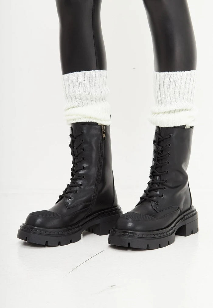 A stylish pair of lace-up ankle boots in black, representing elegant and fashionable footwear.