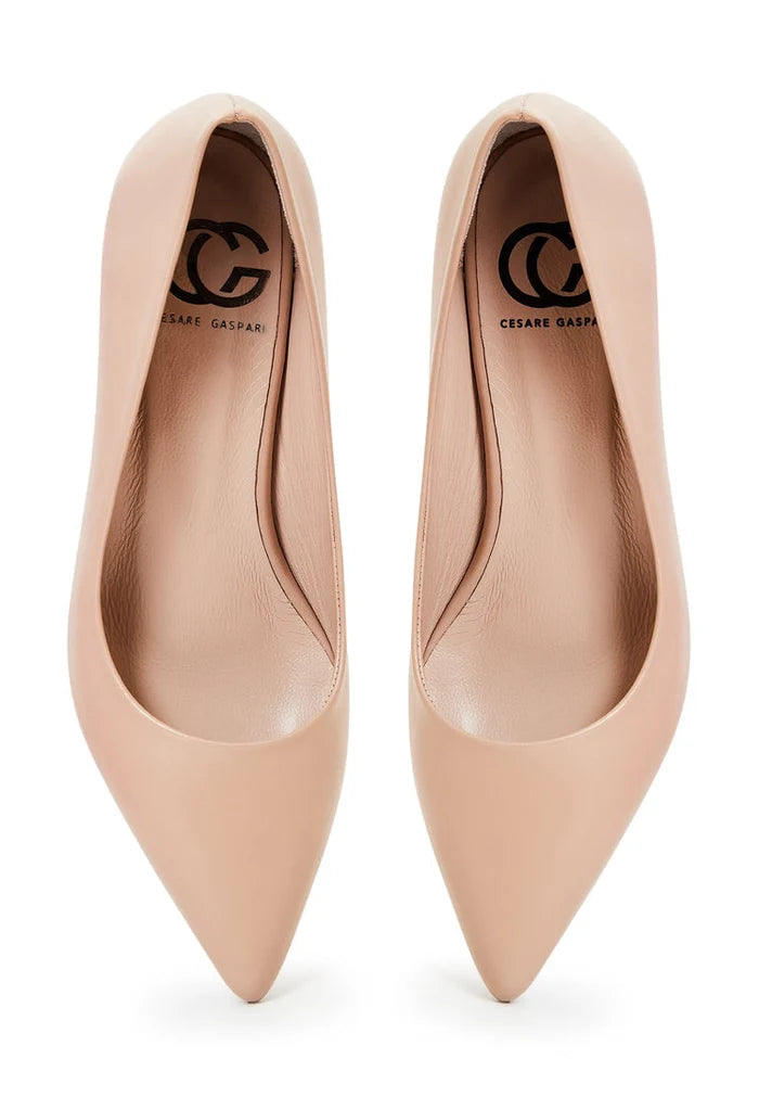 A pair of elegant beige designer heels - luxe shoes for a fashionable look.