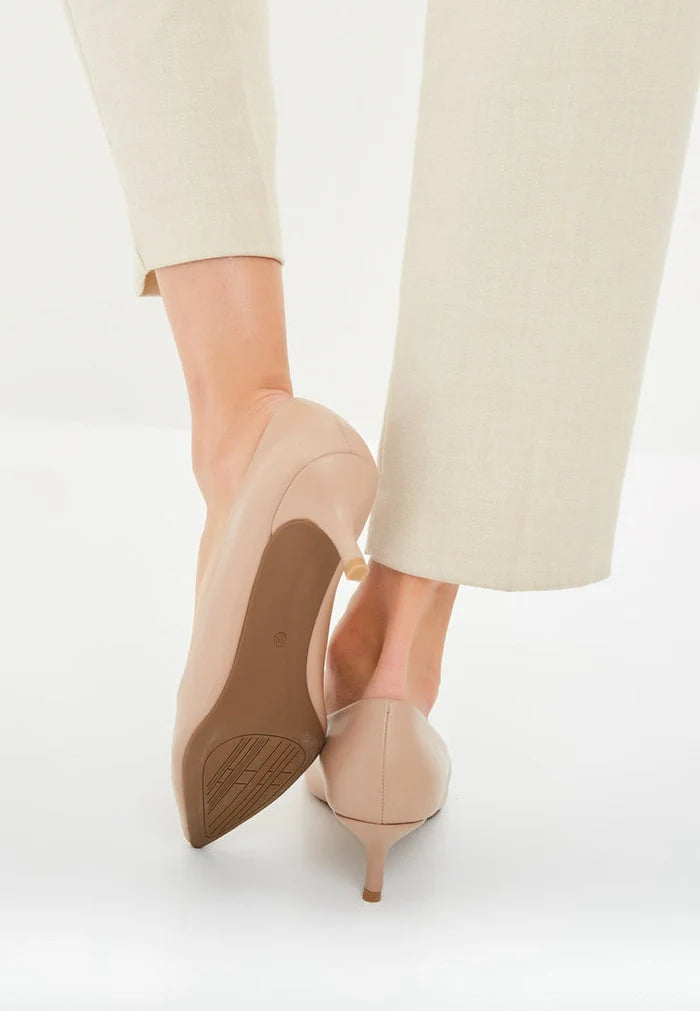 Elegant beige pumps, luxe designer heels in fashionable stilettos - the perfect addition to your shoe collection.