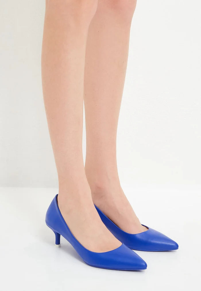 A pair of elegant blue designer pumps, showcasing high-end footwear with a luxe design.