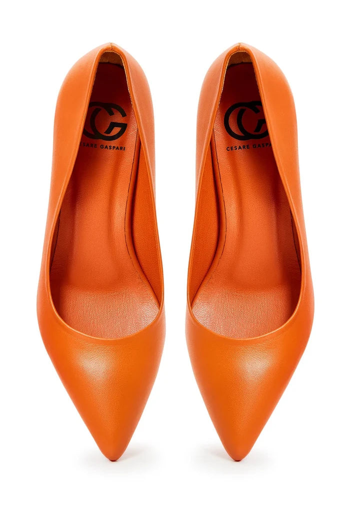 A pair of elegant designer pumps in luxurious orange, the epitome of high-end footwear with a touch of sophistication.