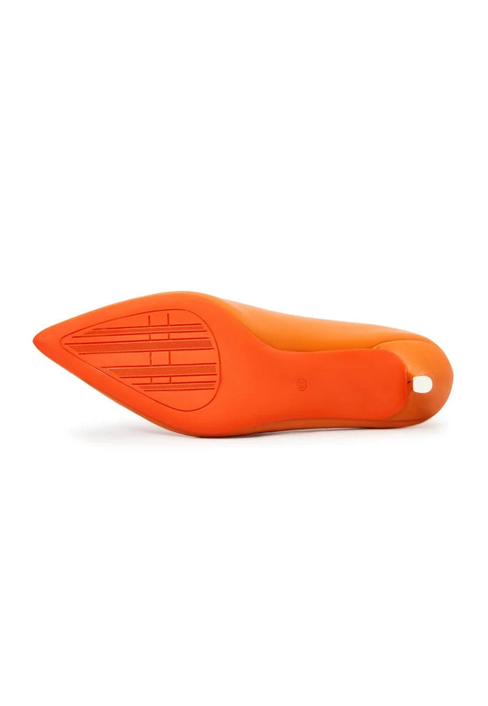 A pair of elegant orange designer pumps, showcasing high-end footwear and luxury heels.