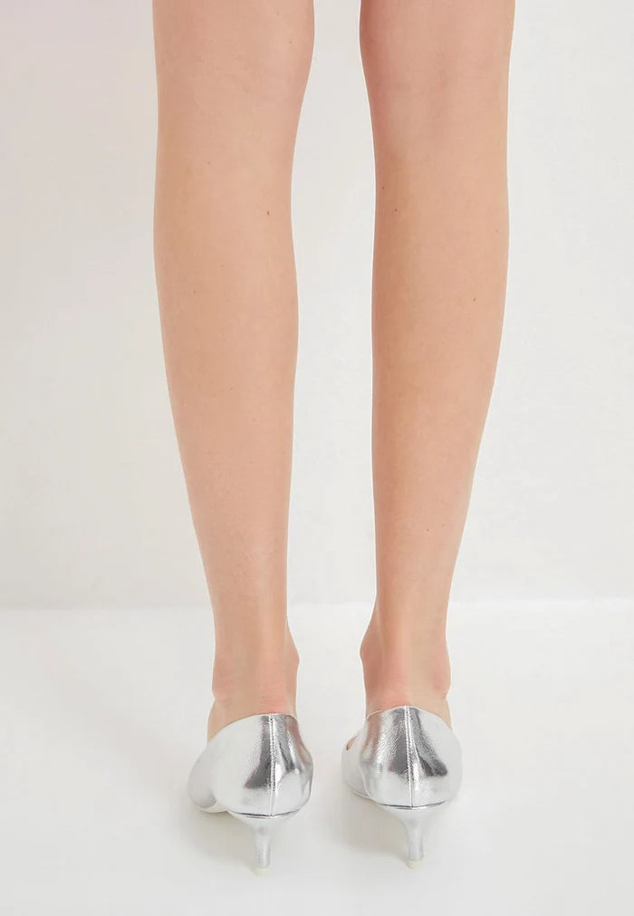 Strut in style with these stunning silver pumps - the epitome of luxe elegance in women's high-end footwear.