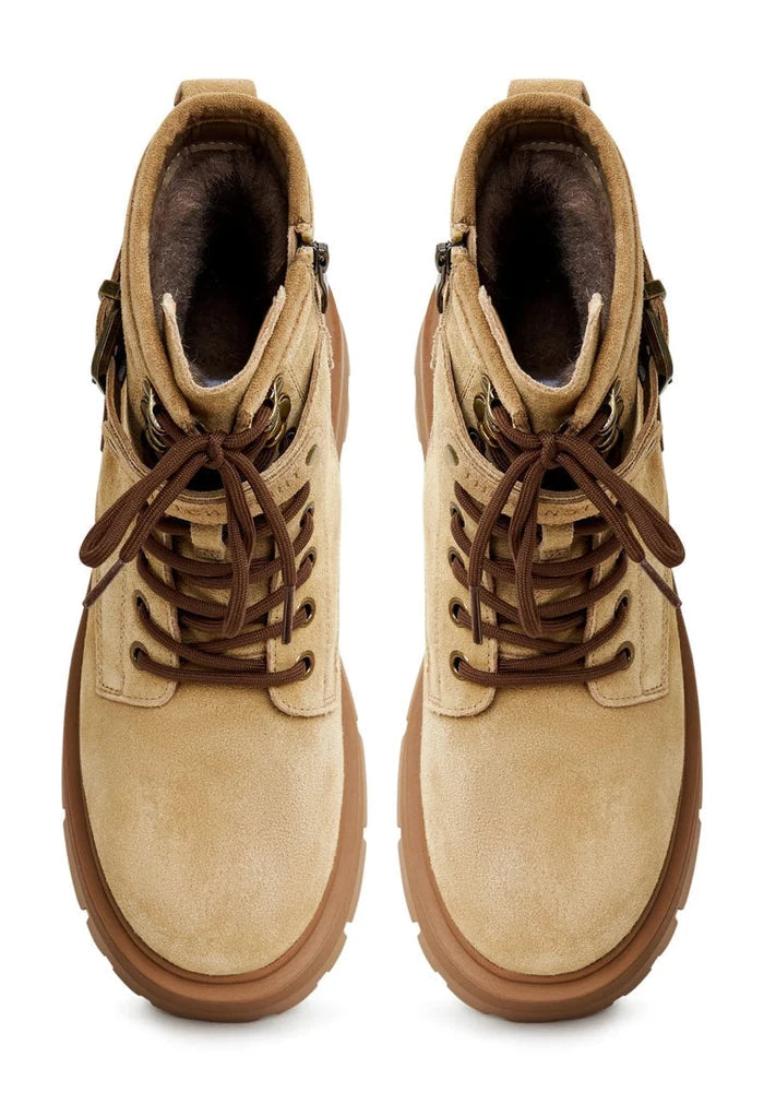 A pair of elegant platform ankle boots in beige, perfect for a stylish addition to any women's fashion footwear collection.