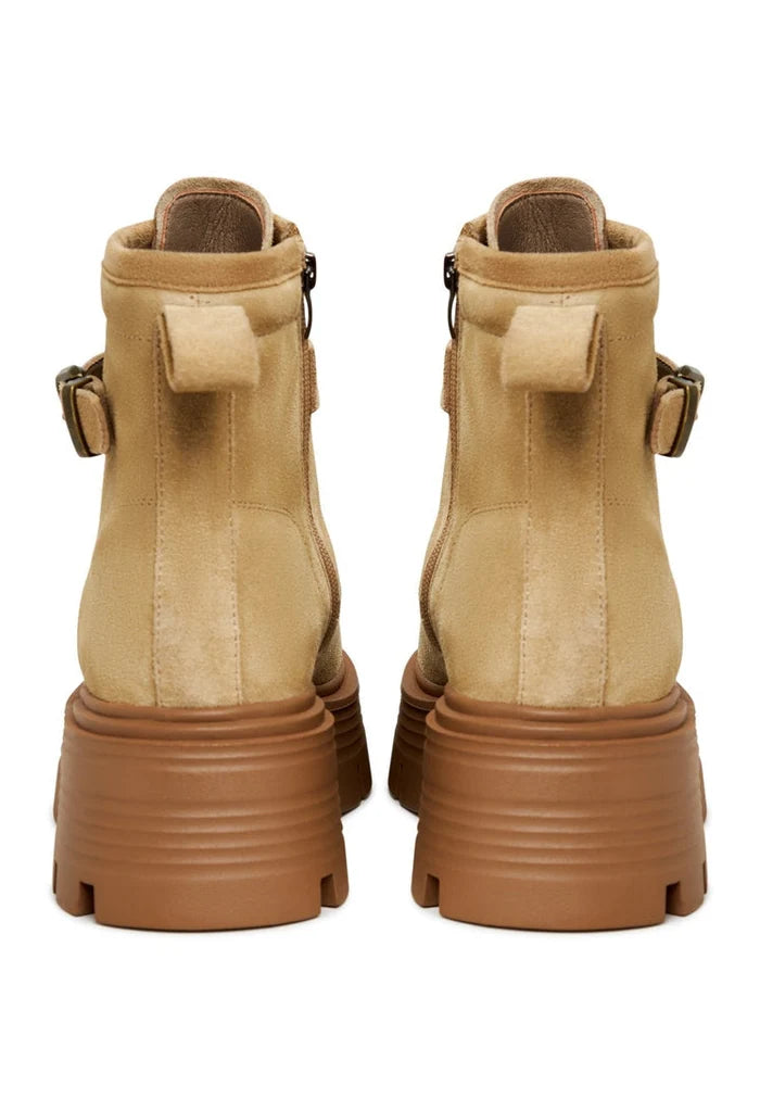 A pair of elegant platform ankle boots in beige, perfect for showcasing stylish women's fashion footwear.