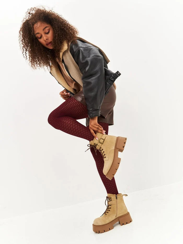 A stylish pair of elegant platform ankle boots in beige, the perfect addition to any women's fashion footwear collection.