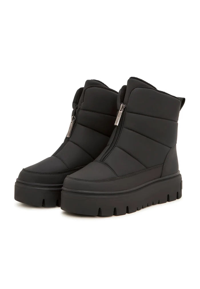 A stylish and elegant pair of black snow boots, perfect for winter fashionistas.