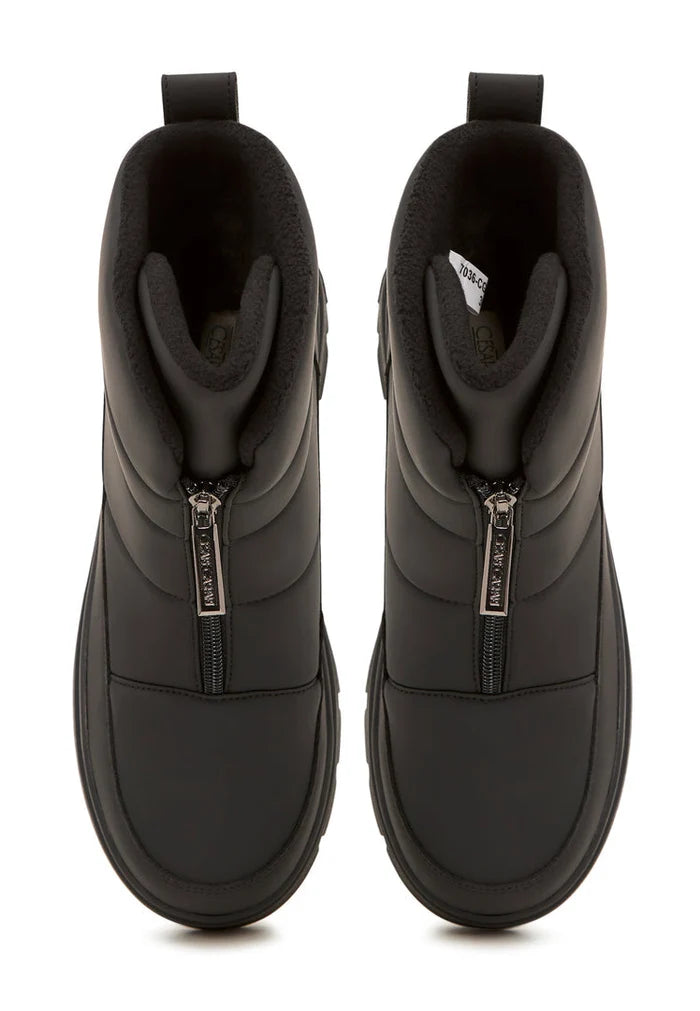 A pair of elegant black snow boots, perfect for the winter season, combining style and functionality.