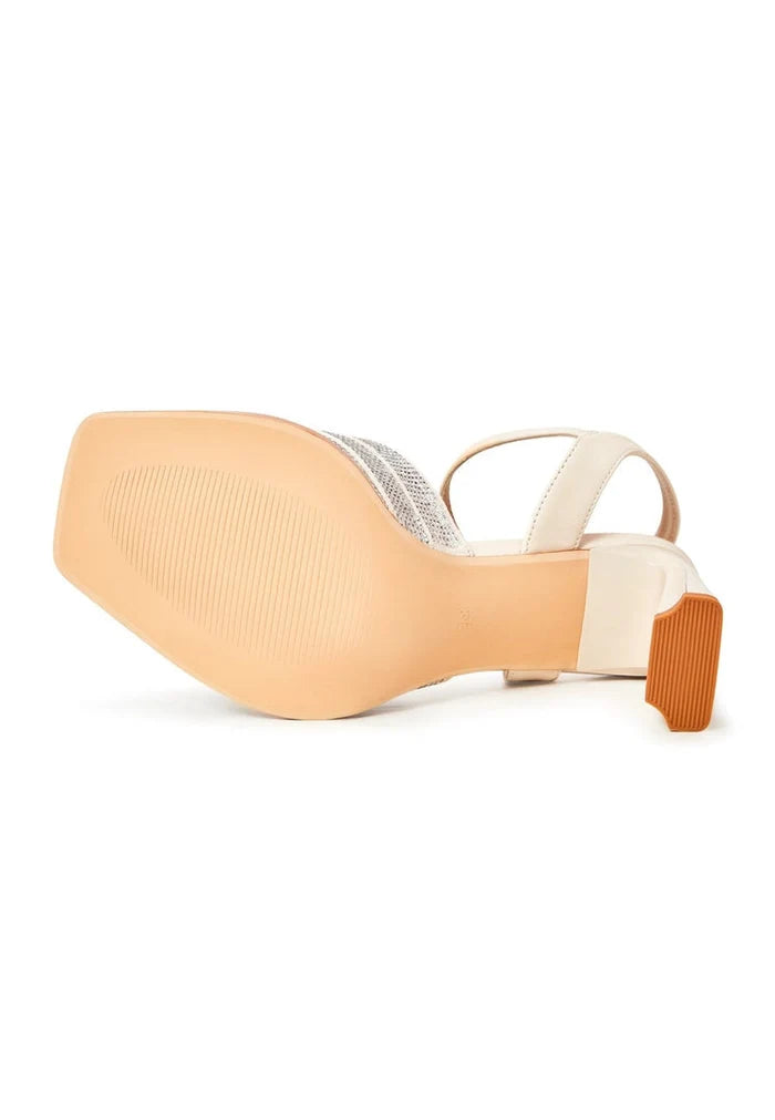 A pair of chic women's beige sandals, designed for elevated elegance and stylish sophistication in footwear fashion.
