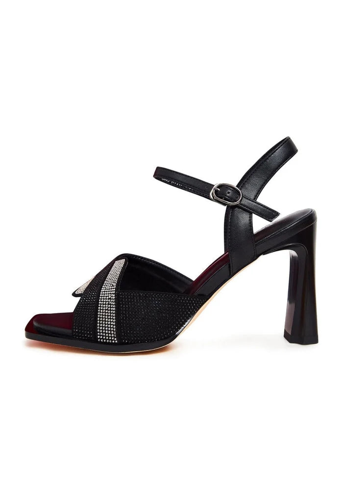 A pair of stylish and upscale black sandals with an elegant design, perfect for any formal occasion.