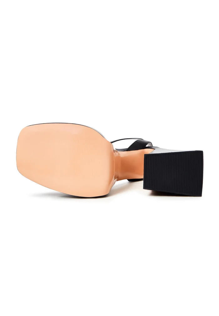 A pair of chic and sophisticated black sandals with an elevated heel, perfect for stepping out in style.