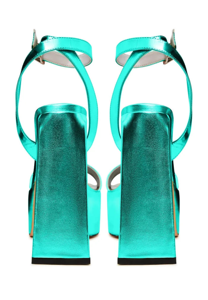 Step into summer with these fashionable luxury green sandals, showcasing elevated elegance and designer footwear style.