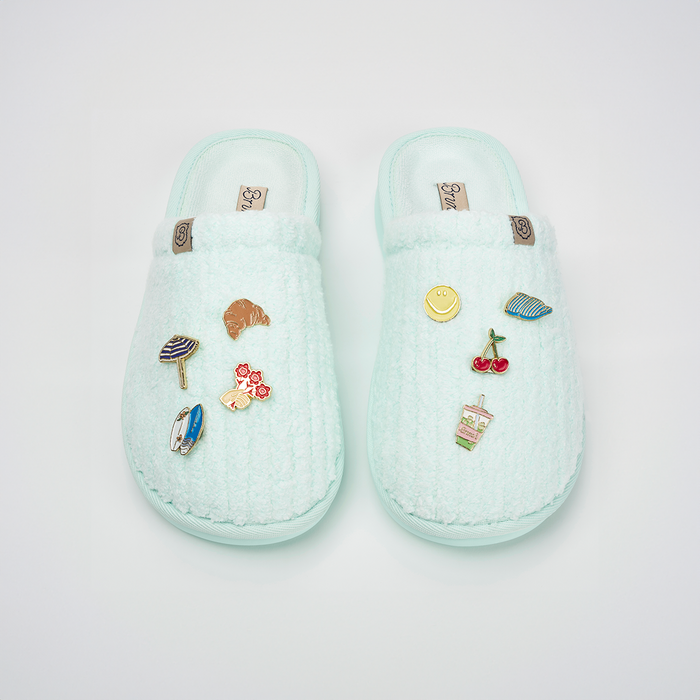 Top view of Essential Lido Ribbed Terry slippers in aqua showing ribbed terry upper, cushioned sole, and magnetic charms