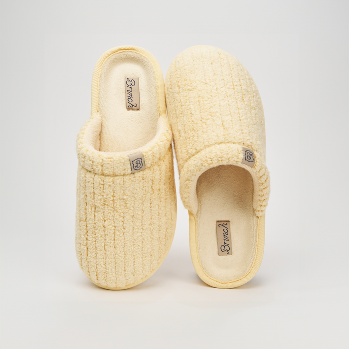 Top-down view of Essential Limoncello Ribbed Terry slippers showing ribbed texture and Brunch logo on white background