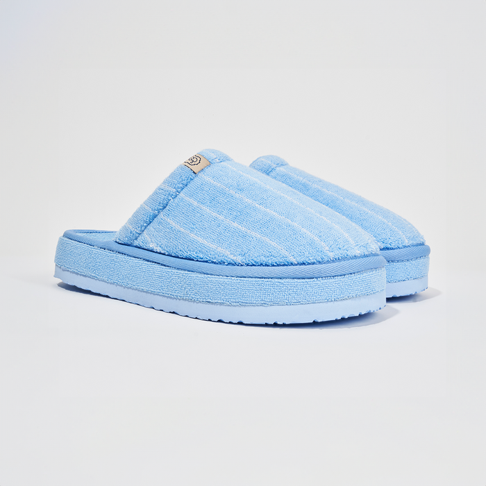 Three quarter view of Cabana Essential XXL slipper in blue striped terry showing terry upper and thick platform sole on white